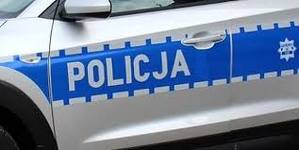 na zdjęciu drzwi radiowozu z napisem Policja